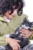 5731289-very-cute-child-with-a-cat-in-arms